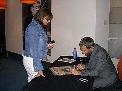 Yusuf Islam signing autograph